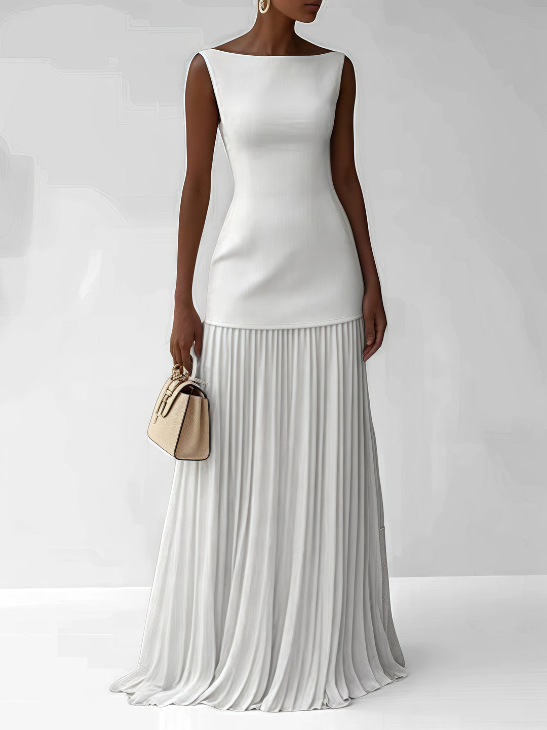 Luxe witte maxi jurk met plissé rok, gedragen door model bij Lenoriva