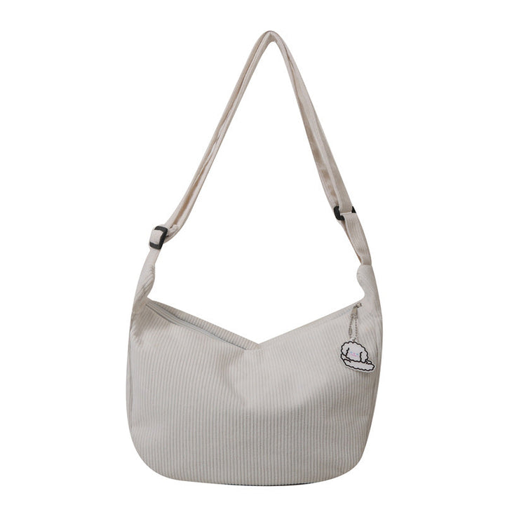 Dames corduroy schoudertas met artistiek design