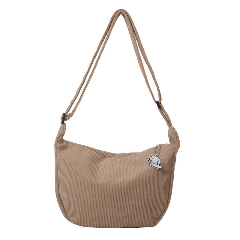 Dames corduroy schoudertas met artistiek design