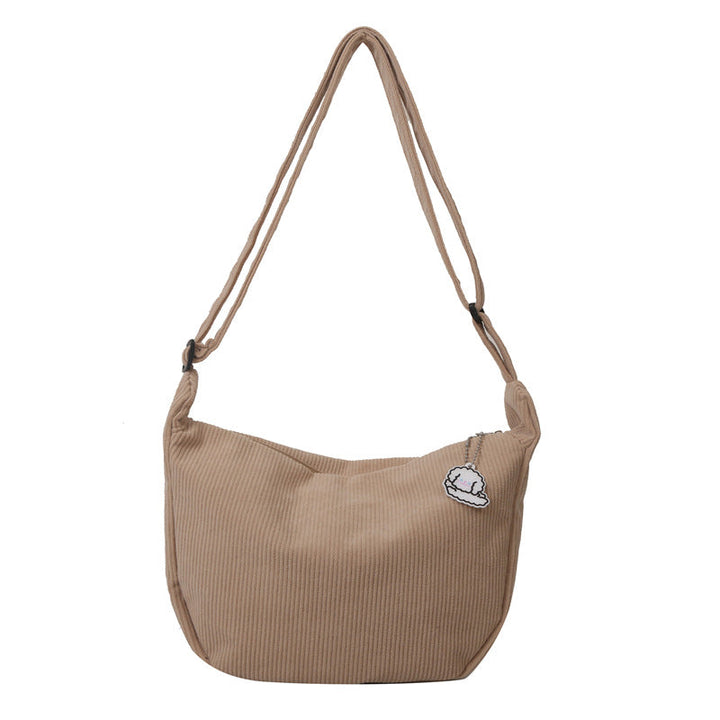 Dames corduroy schoudertas met artistiek design