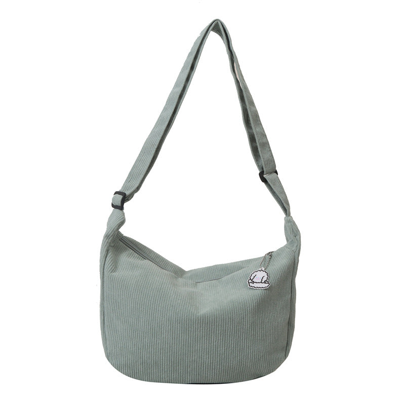 Dames corduroy schoudertas met artistiek design