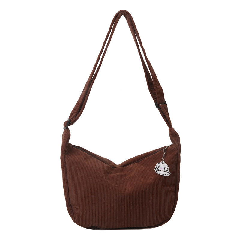 Dames corduroy schoudertas met artistiek design