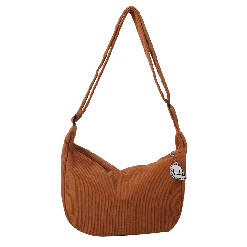 Dames corduroy schoudertas met artistiek design