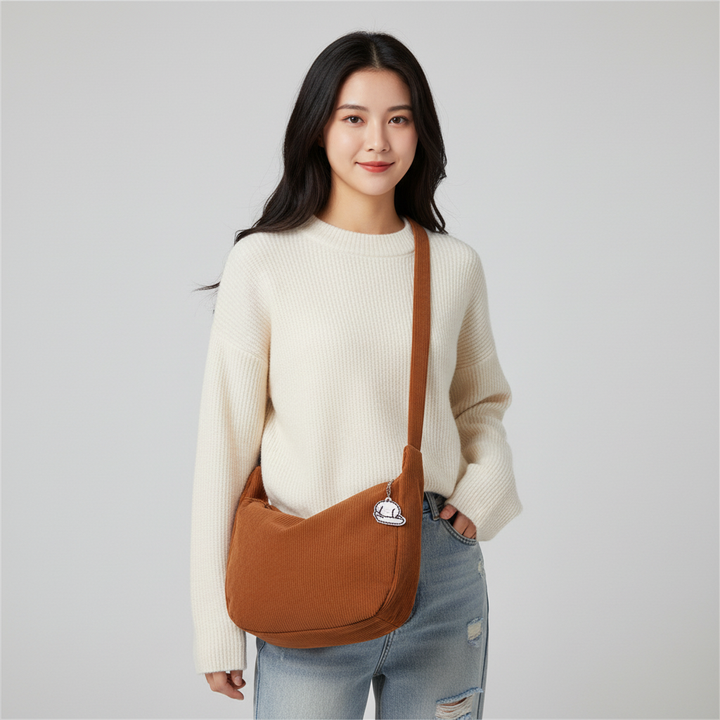 Dames corduroy schoudertas met artistiek design