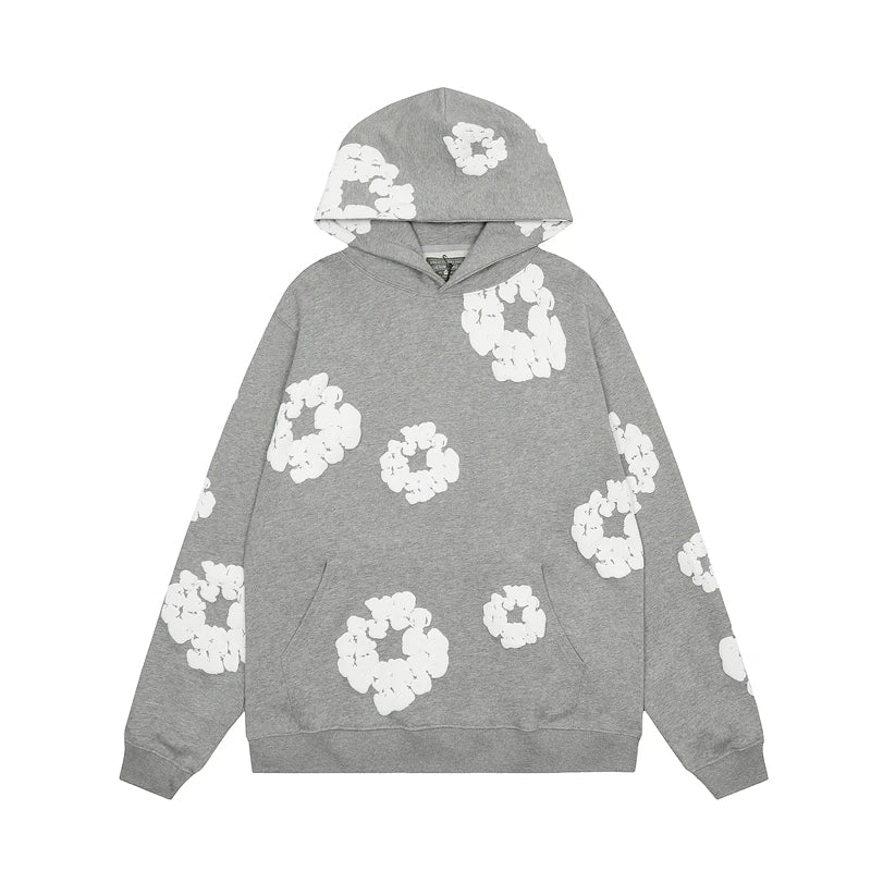 Noa – Denim hoodie met bloemmotief