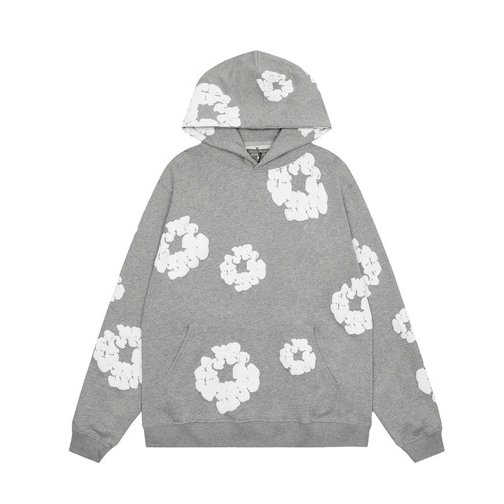 Noa – Denim hoodie met bloemmotief