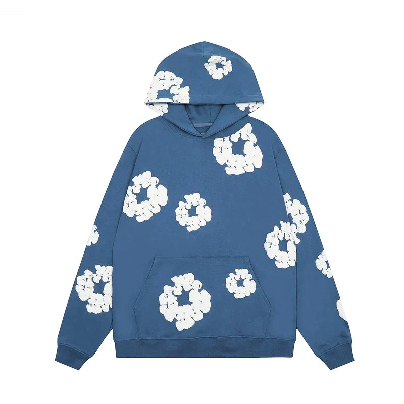 Noa – Denim hoodie met bloemmotief
