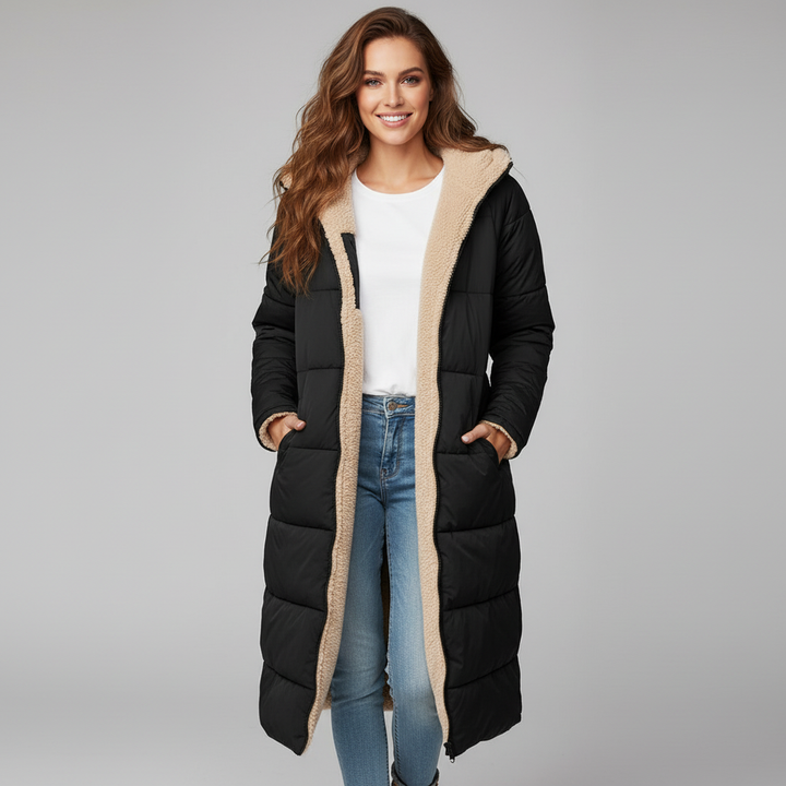 Lange comfortabele damesjas met zachte voering en stijlvolle snit