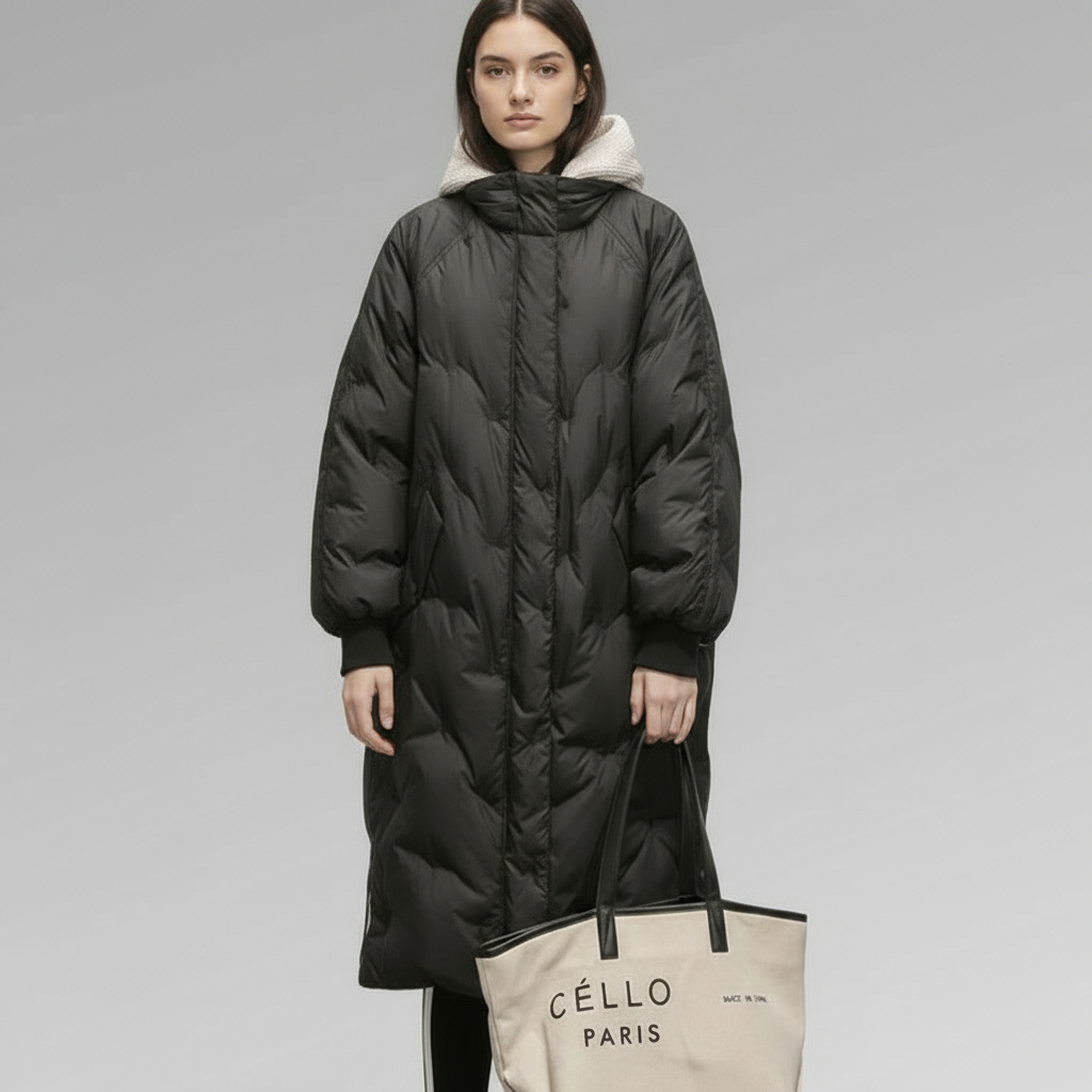 Warme dames pufferjas Femke met capuchon, waterafstotend en lichtgewicht ontwerp, ideaal voor koude dagen.